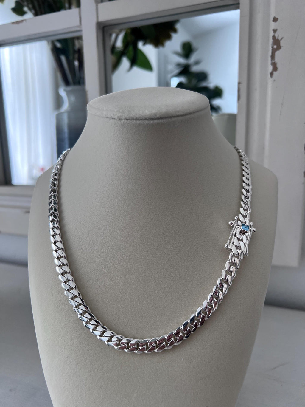 8mm silver Cuban link with blue topaz