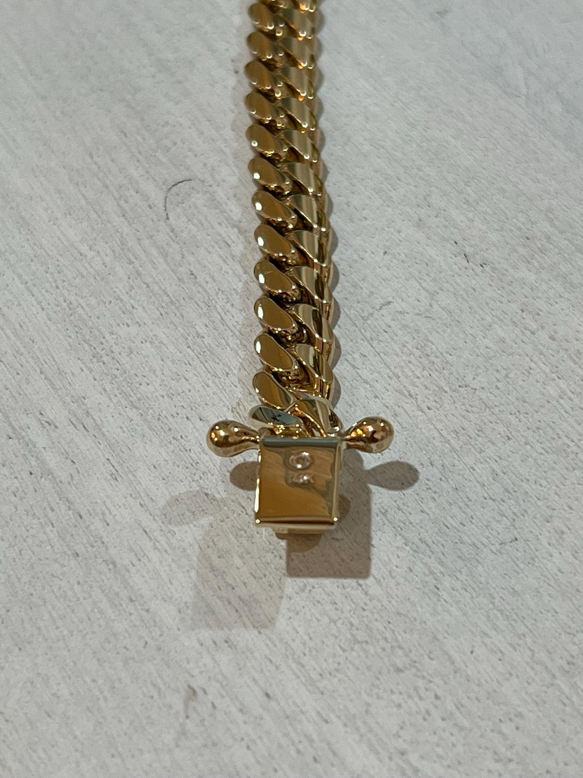 Gold necklace worn