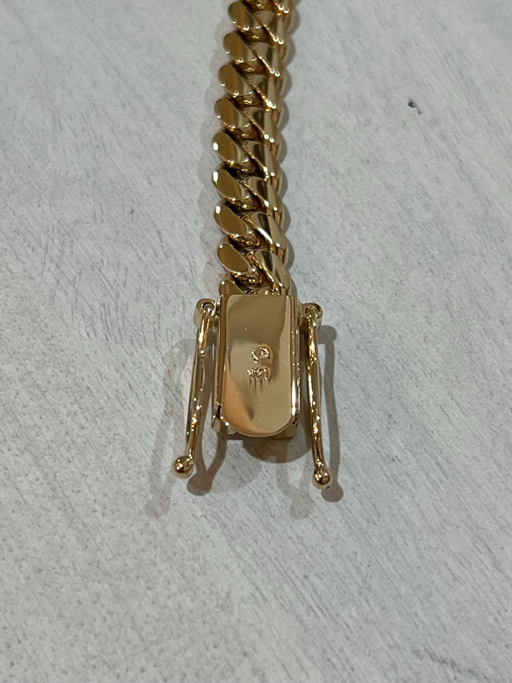Gold necklace angle view