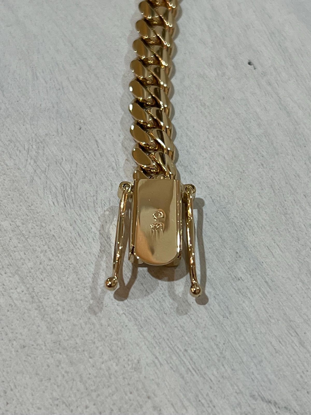 Gold necklace angle view