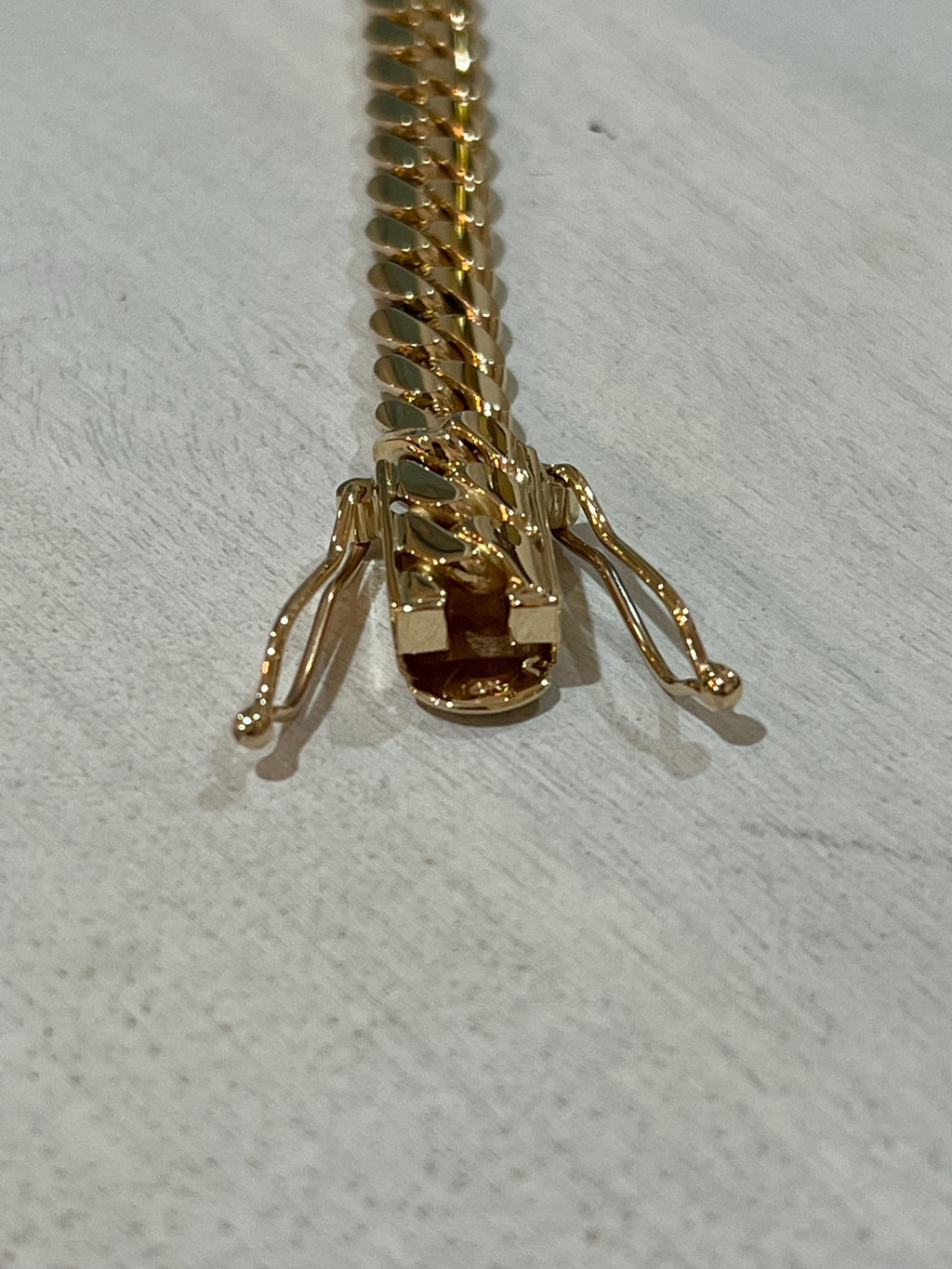 Gold necklace detail