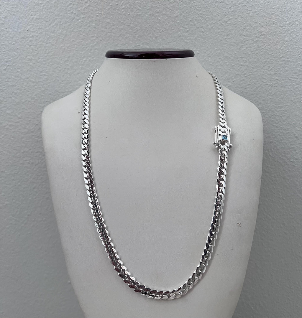 7mm silver Cuban link with blue topaz