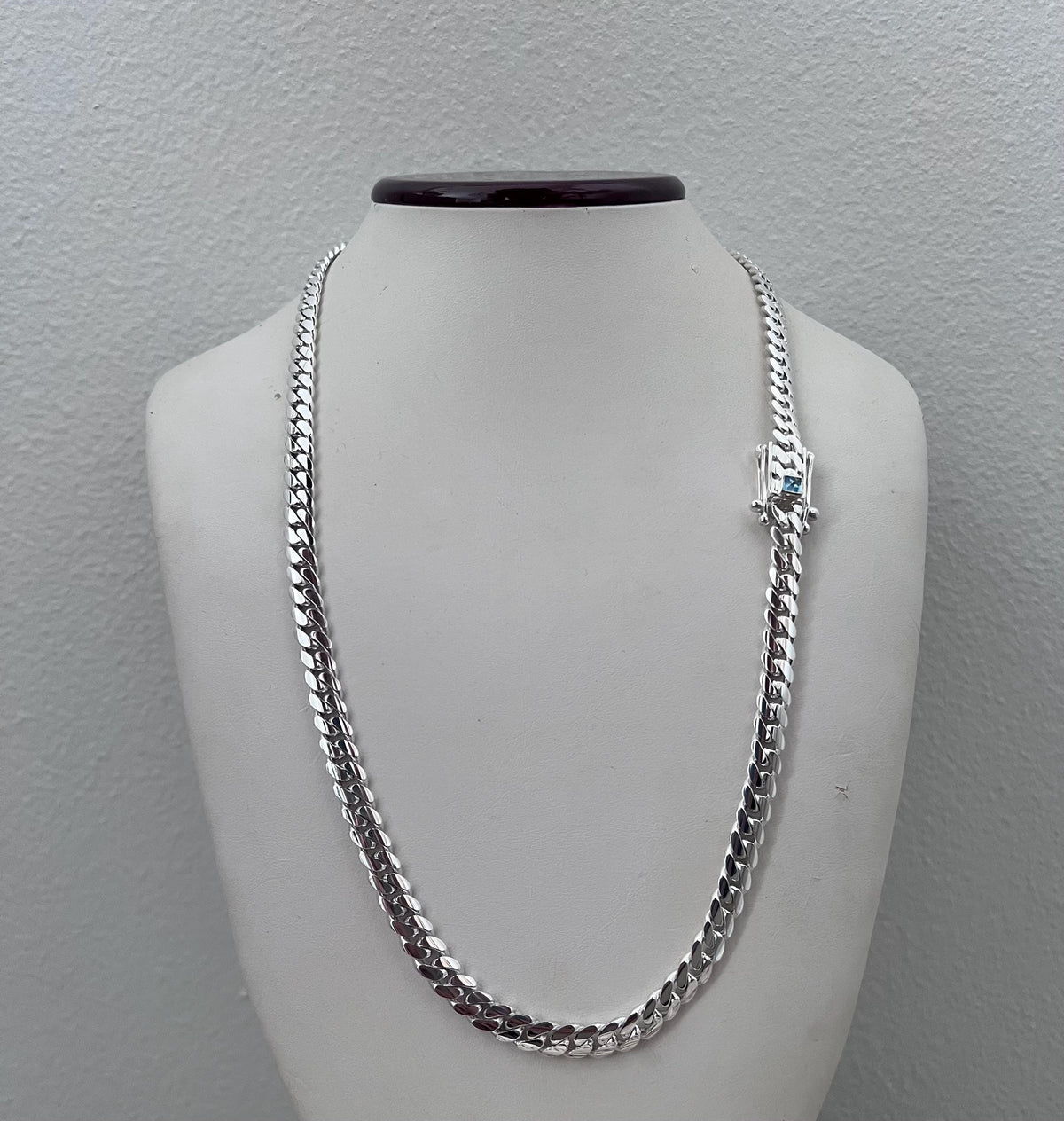 7mm silver Cuban link with blue topaz