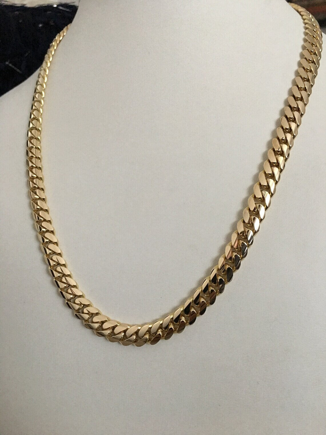 Gold necklace worn