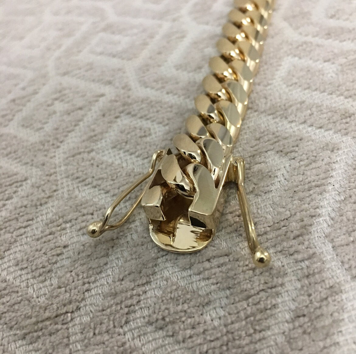 Gold bracelet worn