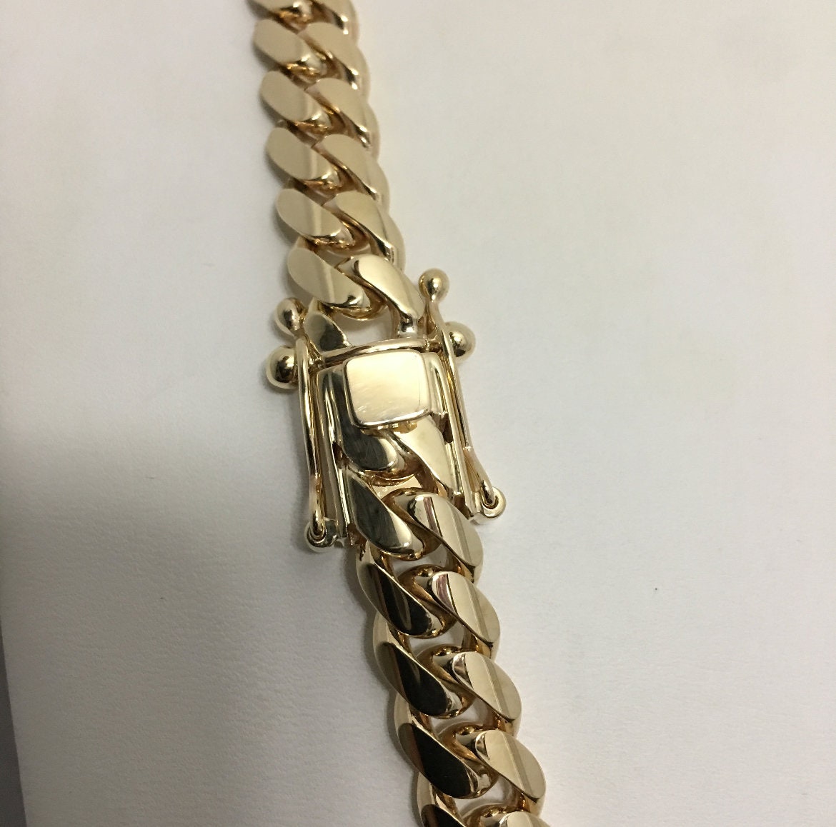 Gold necklace worn