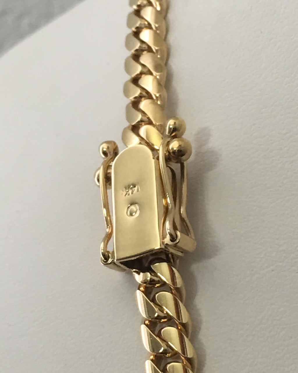 Gold necklace worn