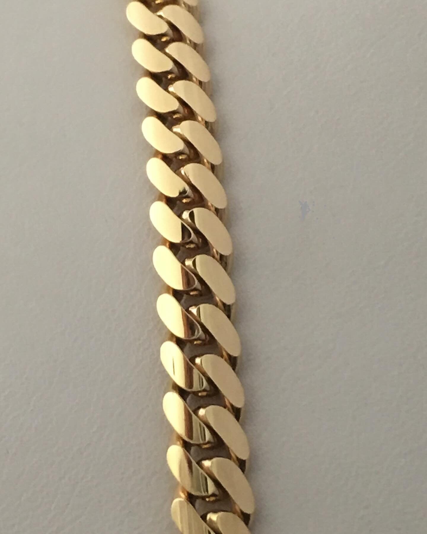 Gold necklace angle view