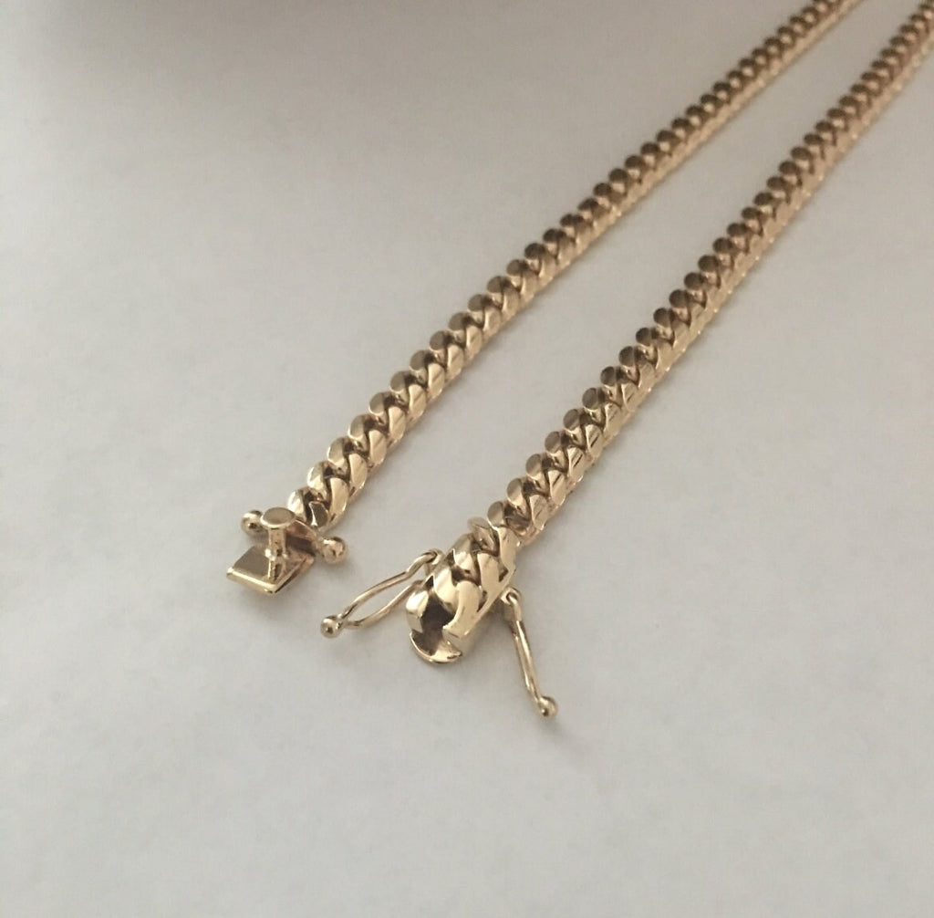 Gold chain worn