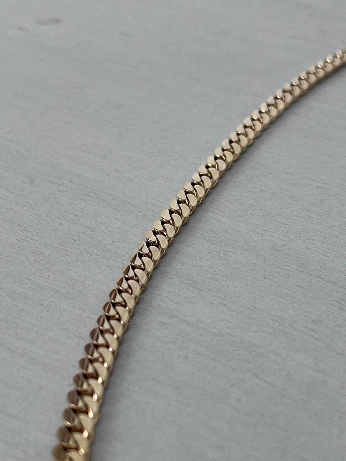 Gold necklace worn